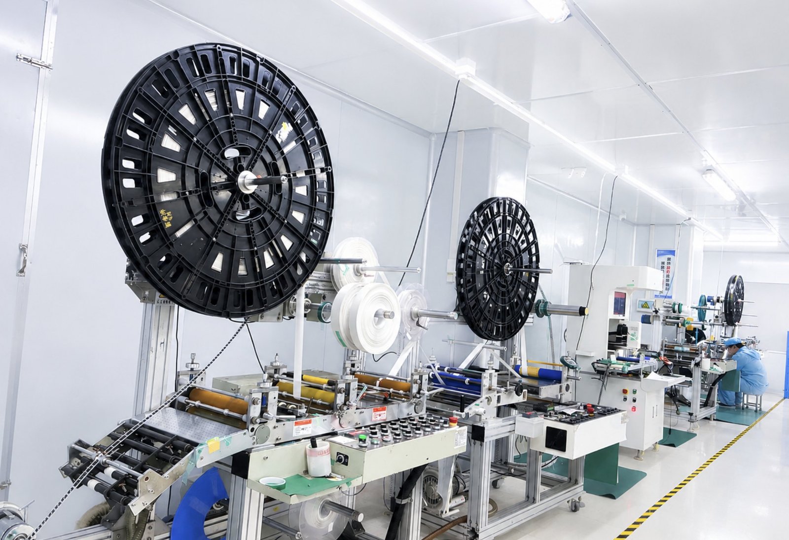 Flatbed die cutting production line for precision converted materials
